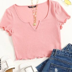 It’s a baby pink crop top